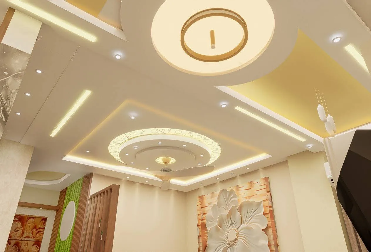 A stunning organic-curved false ceiling featuring hidden LED cove lighting, creating a soft and luxurious ambiance for the living room.