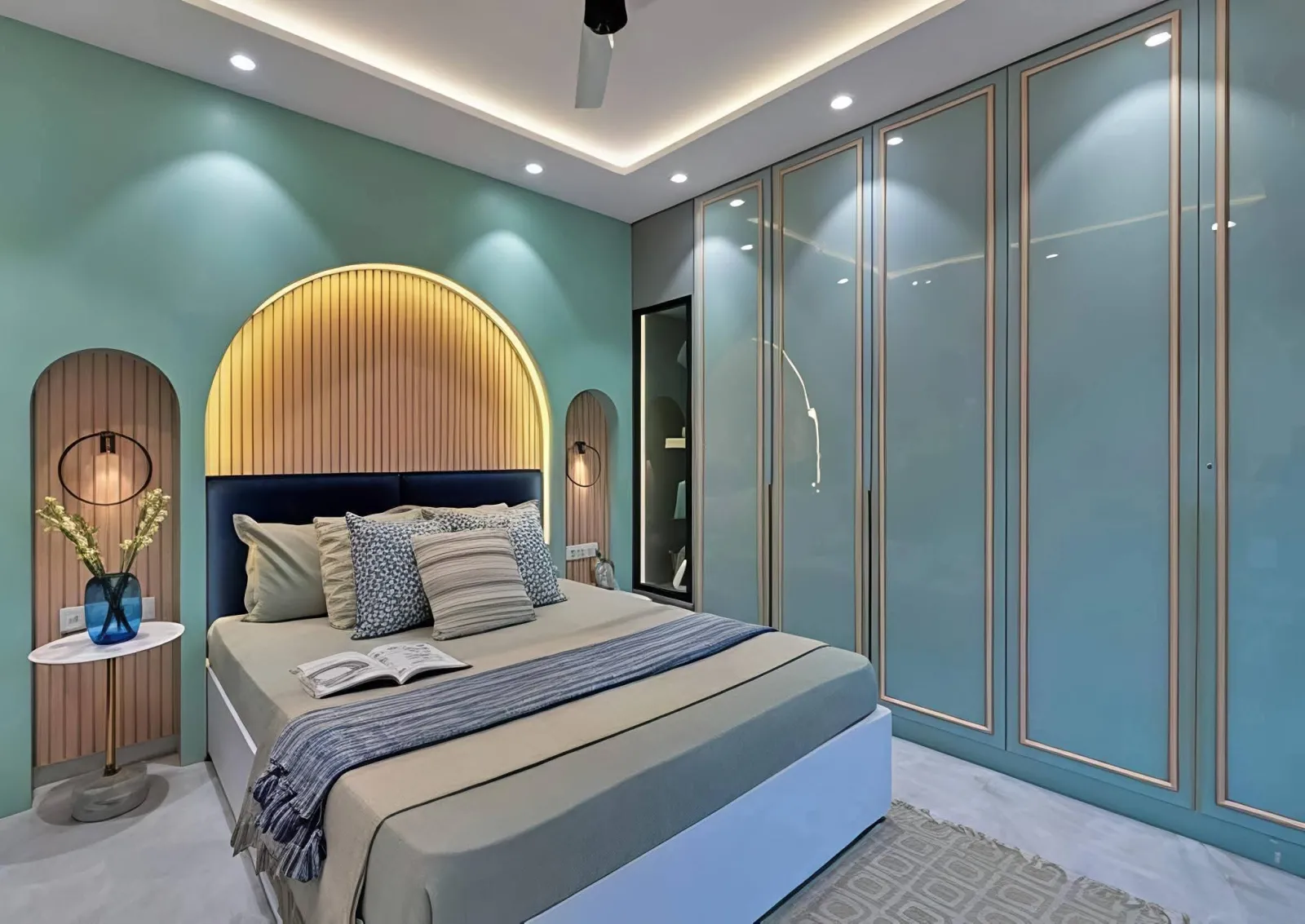 Bedroom Interior Design in Amtala — Comfortable bedroom with customized wardrobe, modern furniture, coordinated colours and warm lighting.