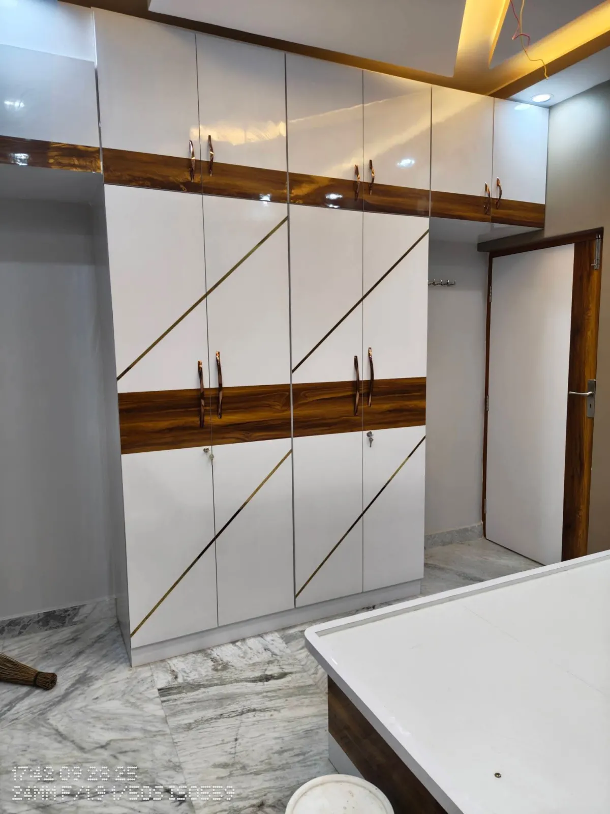 Modern home interior design in Shakuntala Park, Kolkata, featuring customised furniture, functional storage, elegant finishes and practical space planning.