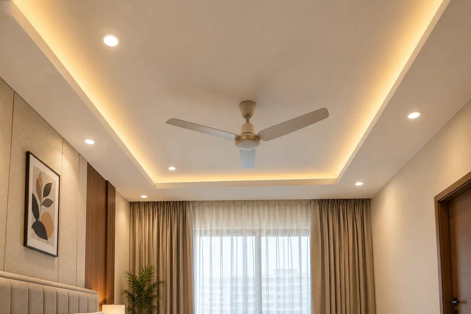 Agnimitra Interior Design offers false ceiling design services in Diamond Harbour for modern homes, flats and apartments. Our ceiling design solutions include contemporary gypsum ceilings, decorative ceiling patterns, concealed LED strip lighting, recessed spotlights and coordinated lighting layouts. We focus on suitable designs that complement the room's interior style, furniture arrangement and lighting requirements. Our false ceiling planning helps homeowners create visually balanced living rooms, bedrooms and other residential spaces according to their preferences and budget.