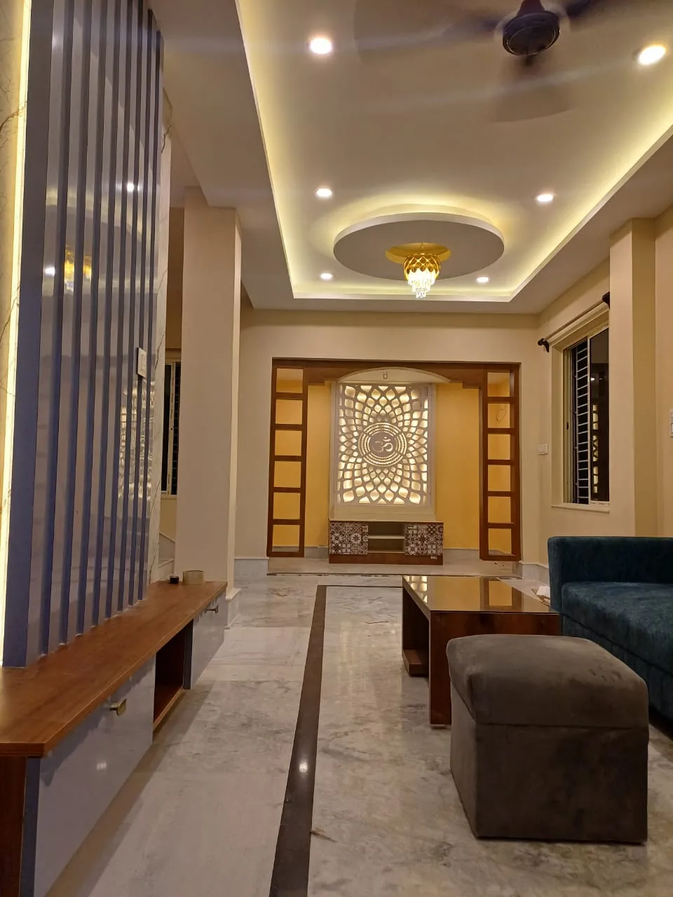 Explore modern false ceiling design in Haridevpur, Kolkata, with stylish ceiling patterns, concealed LED strips, recessed spotlights and decorative lighting. Agnimitra Interior Design considers room dimensions, ceiling finishes and lighting placement to complement living rooms, bedrooms and dining areas. Practical ceiling design and coordinated illumination can enhance the appearance of your home while supporting comfortable everyday use.